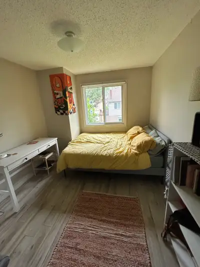 Bright and spacious bedroom July 1st