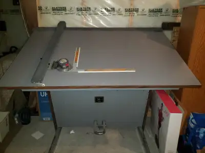 Full size drafting table 5'x3' Pedal activated for horizontal and vertical inclination Comes with 2...
