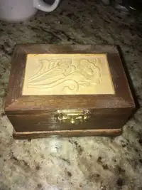 Exquisite hand-carved wooden jewellery box