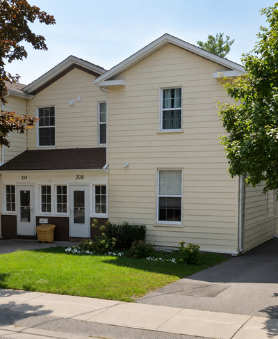 Welcome to the lower unit at 208 Henry St in Whitby — a unique 1 bedroom plus den, 2 bathroom suite...