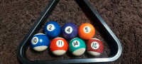 7 Small pool balls with triangle 