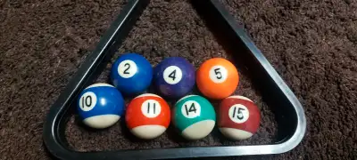 7 Small pool balls with triangle , View more