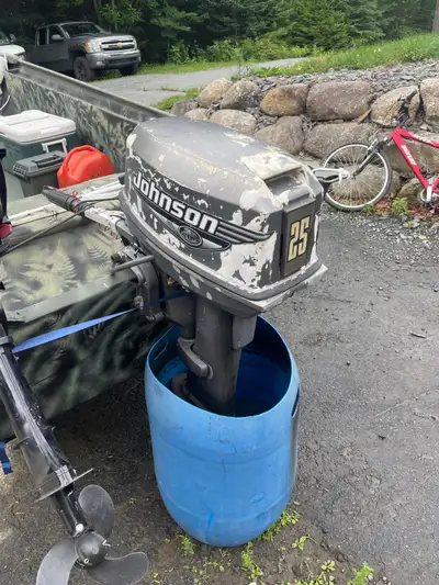 25 Johnson outboard electric start long shaft tiller handle worked good last time I used it 1200 obo...