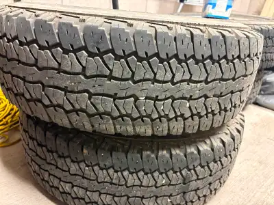 2012 Toyota Tacoma factory rims and all season tires with sensors and nuts $650 for tires and rims $...