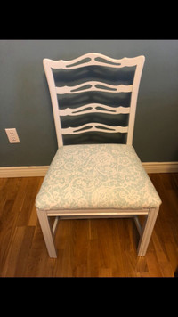 grey light dining chair with blue and white fabric. 