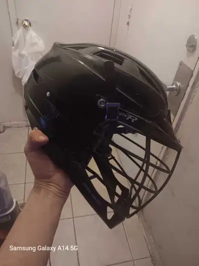 This black helmet offers robust head protection for motorsports. I'm unsure of the exact model, so I...