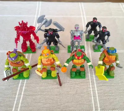 Complete set of Mega Bloks Series 1 Teenage Mutant Ninja Turtles collectible figures. Comes with an...