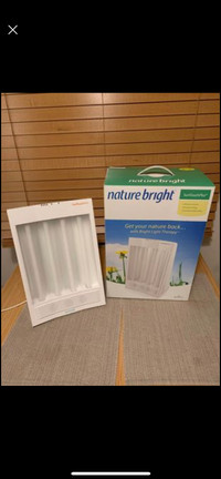 Nature bright light therapy light with negative ionizer.