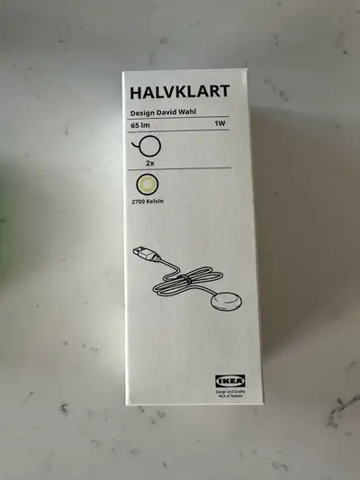New IKEA HALVKLART LED spotlight set. This white 1W light has a warm 2700 Kelvin color temperature a...