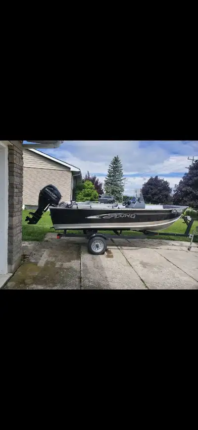 16' lund fury in excellent shape, 25hp 4 stroke runs perfectly, and trailer is black powder coated....