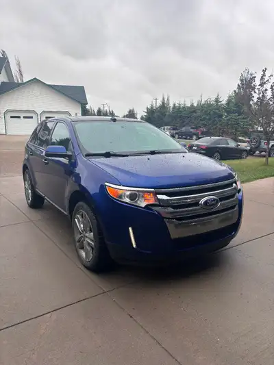 2013 Ford Edge. Price reduced. Leather/heated seats. Command start. All season tires. Sunroof. New b...