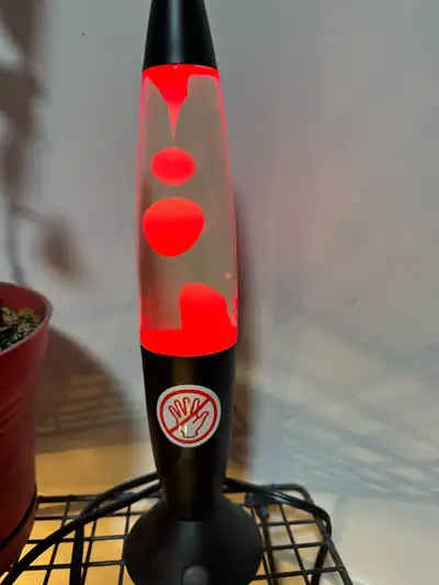 This LED lava lamp is in good condition, offering a vibrant and mesmerizing way to brighten up any r...
