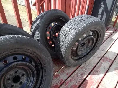 Used studded Nokian "NORDMAN 7" tires on Rims. 2 in very good usable condition, 2 more heavily worn,...