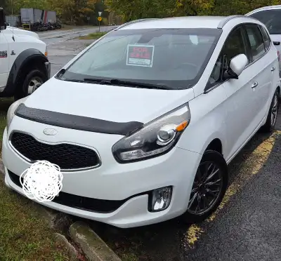 2014 Kia Rondo EX, white exterior with black leather seats and chrome handles. Heated front seats, h...