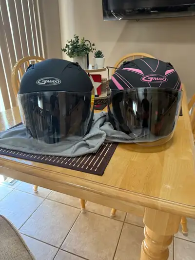 2 Motorcycle Helmets Men’s XL and Woman M. Both in excellent condition, used for 1 season Asking $20...