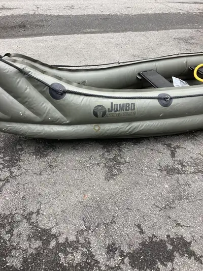 14 foot Luftboote jumbo indio spezial inflatable canoe. Comes with 2 paddles, foot pump and pack boa...
