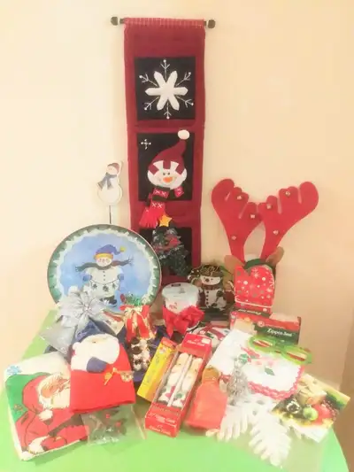 An assortment of around 50 Christmas and festive decorations and tableware for just $35, or buy the...