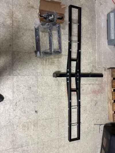 Brand new (never used) Erickson motorbike carrier. All Accessories included. 2” hitch receiver.