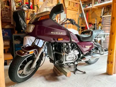 1984 Honda Gold Wing motorcycle in storage for a few years. Project for a serious person. Many parts...