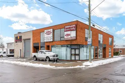 This exceptionally built almost 8405 sq ft all brick commercial building offers an ideal live-work o...