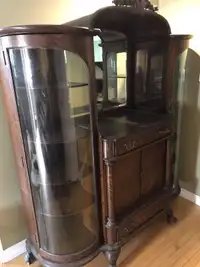 Antique bow front cabinet