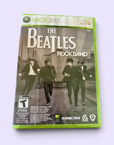 À collection of pre-owned Xbox 360 titles, featuring a variety of classic action, racing, and rhythm...