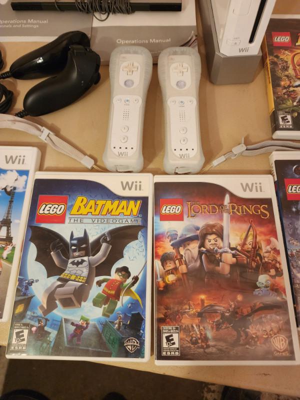 Nintendo Wii with 4 Controllers and 7 Games and Manual in Nintendo Wii in Edmonton - Image 4