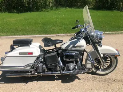 Nice and very stock last year Shovelhead police Harley. (civilianized) No issues. New tires last win...