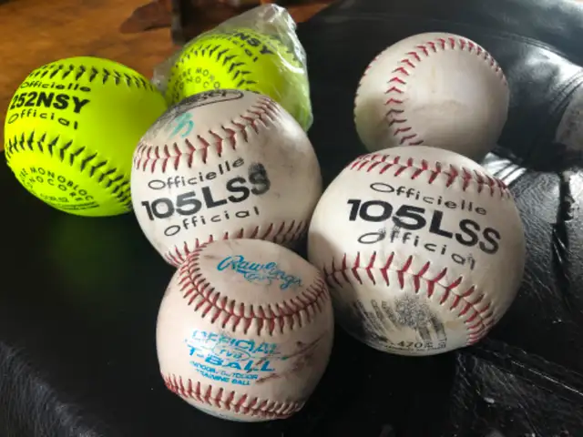 Softball balls + 2630066612778251213