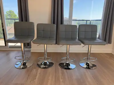 Set of 4 Grey Adjustable Swivel Bar Stools – Excellent Condition, View more
