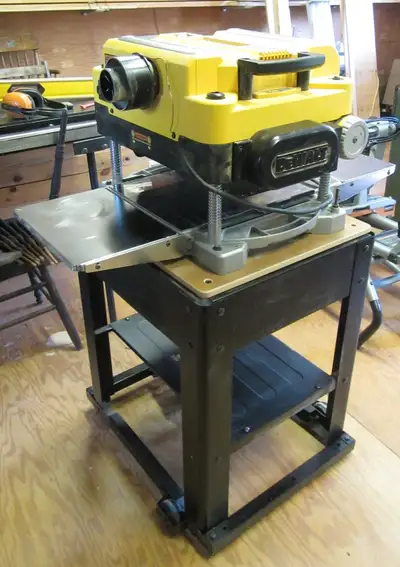 Model DW735. In great condition. INCLUDES: Planer ($680 retail) + Dewalt Table ($330 retail) + 9 “Fo...