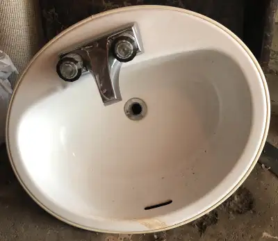 Includes fully functional bathroom sink, faucet, shower head with adjustable settings and the counte...