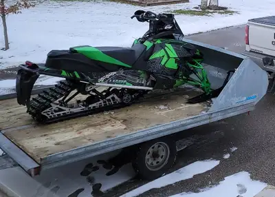 2001 Hyland Tilt Trailer . Has ski bar kit installed , galvanized , solid frame no rot. Tows amazing...