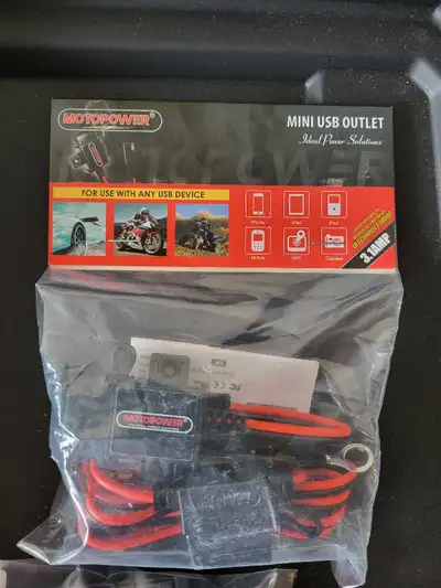 Optimize your motorcycle's charging capabilities with this new MotoPower mini USB outlet, designed f...