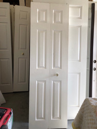Bifold closet door 24x76.5” with hardware 