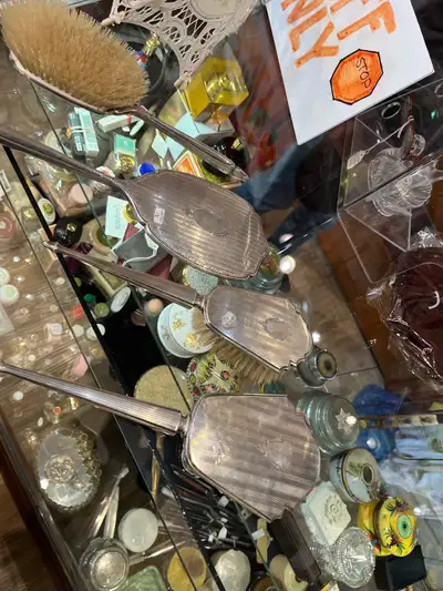 Looking for an antique silver mirror and brush set, View more