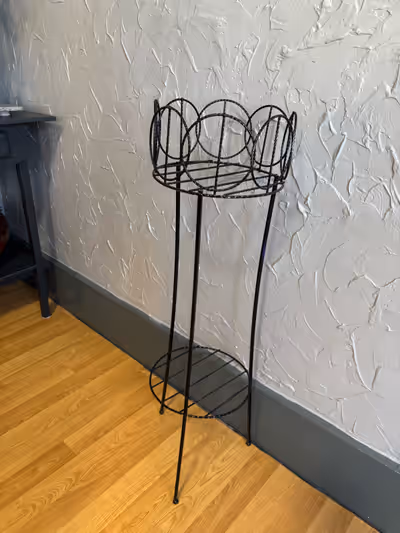 Metal plant stand, 32” tall , 9 1/2” wide. 2 shelves