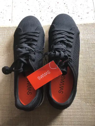 Men's Swims black sneakers. Brand new. Never been worn. Size 10. Great condition. If the ad is up th...