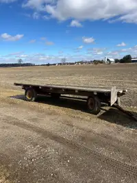 16 foot wood wagon with metal running gear - uses