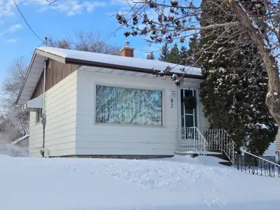 -Immediate possession available- This charming bungalow has been thoughtfully restored, offering pea...