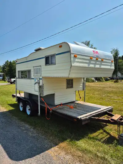 I'm selling a truck camper with a cozy interior, perfect for those weekend getaways! This camper com...