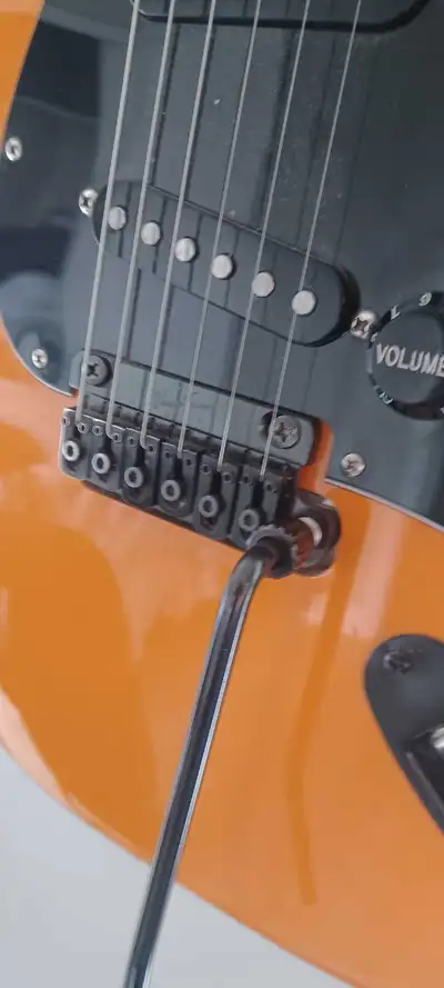 Perfect condition Strat with Vegatrem! Dive bomb and stay in tune. It's a floating system so pulling...