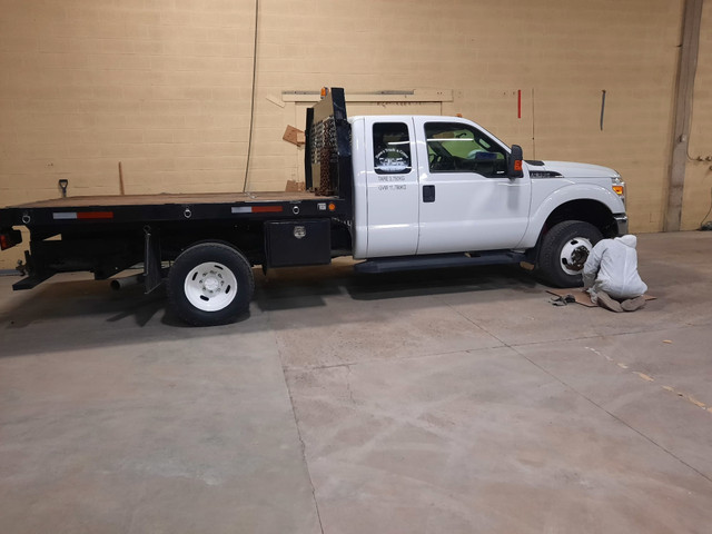 2012 F350 Dually ext cab Flat Deck (RETIREMENT SALE) in Cars & Trucks in Calgary