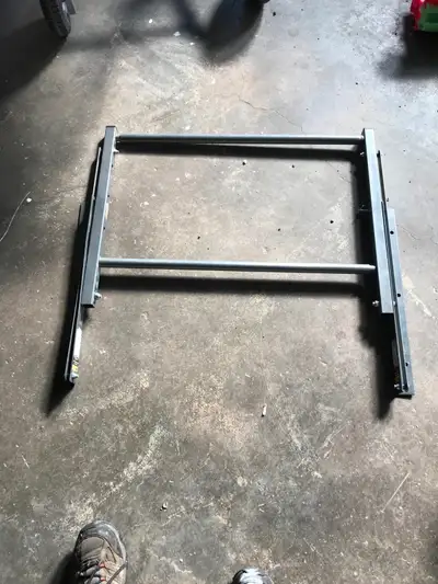 Wall mounting bracket storage rack. expands to hold 4 tires $30 or best offer