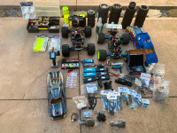 TRAAXAS REVO 2.5 AND E REVO WITH LOTS OF SPARE PARTS