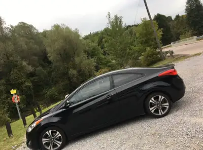 2013 Hyundai Elantra Coupe - 170,000 km - Key Features: • clean leather seats and interior • 2.0L 4-...