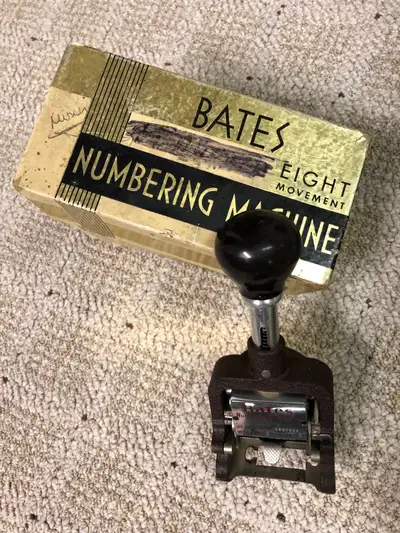 Antique numbering machine used to number tickets or bills of sale. In working order.