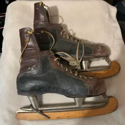 Vintage CCM hockey skates and original skate guards, View more