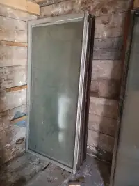 Sliding glass patio doors, storm door, sliding screen.