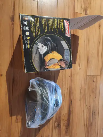 Never used, Coleman Blackcat propane catalytic heater. Flameless, warmth for outdoors or in spaces l...